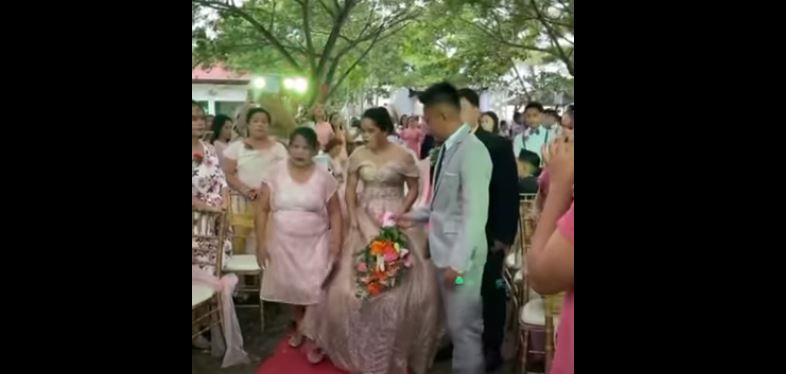 تعثرت فخرج رجل من تحت فستانها يوم زفافها (فيديو)