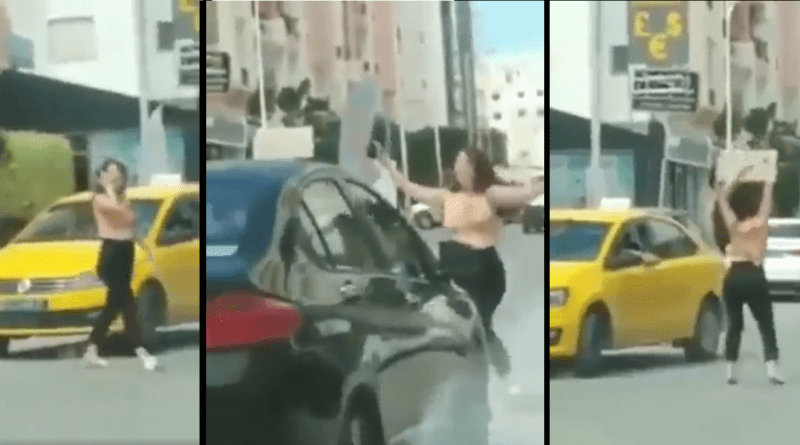 حي الواحات : فتاة  ترقص وسط الطريق وتمنع السيارات من المرور